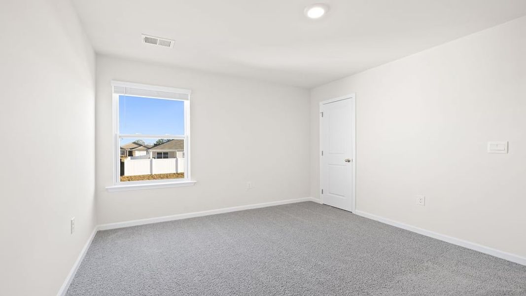 Spacious, unfurnished interior of a new home in Lightwood Cottages, Moore (Image 23).