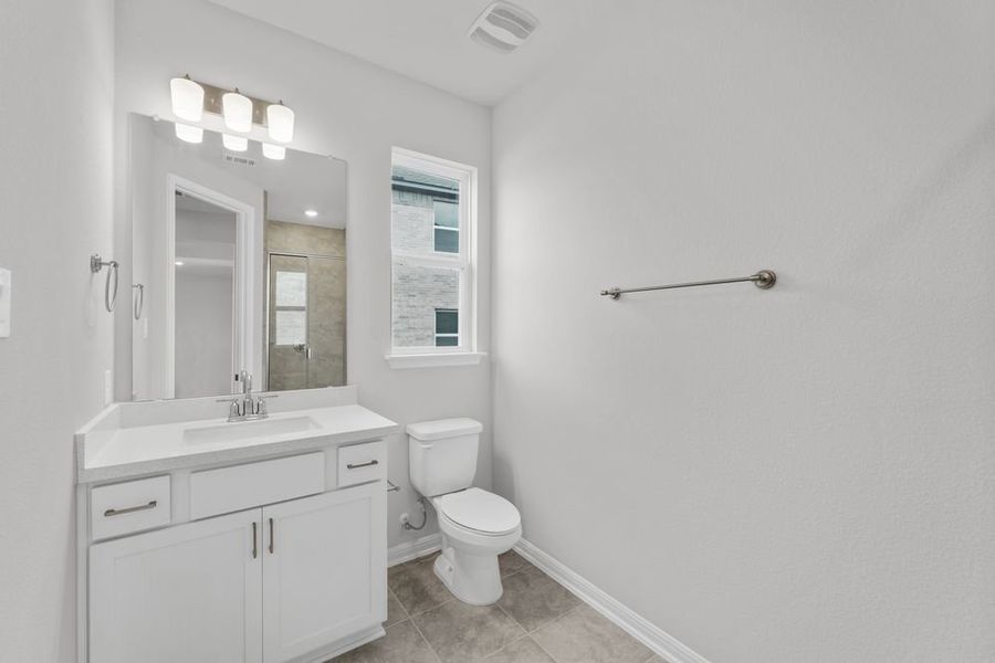 Furnished interior view inside a new home in Parkside on the River 60s, Georgetown (Image 7).