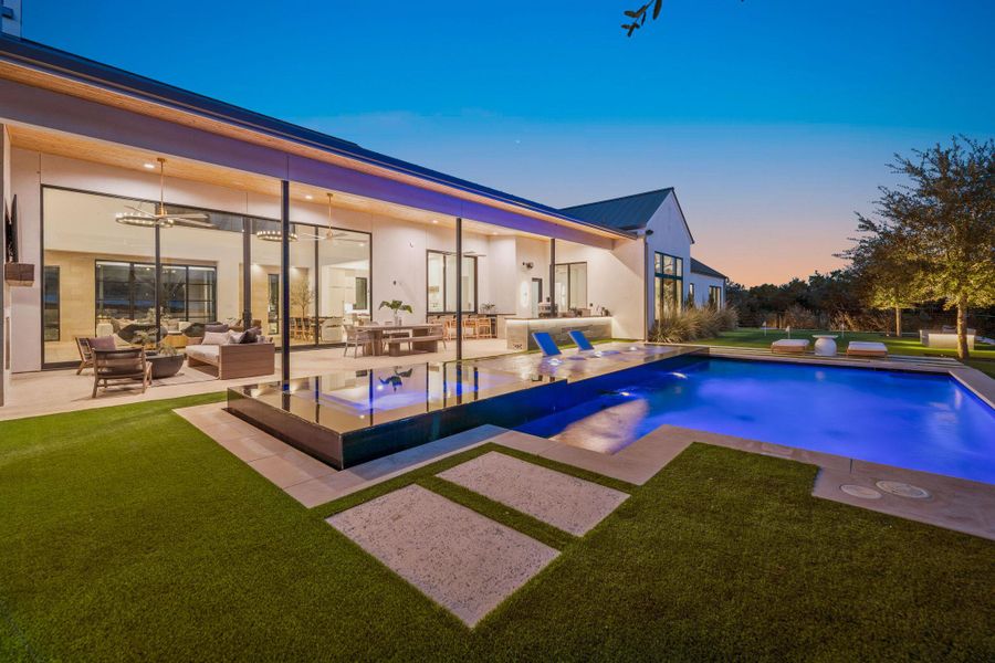 Exterior details and patio area of a home in , Spicewood (Image 26).