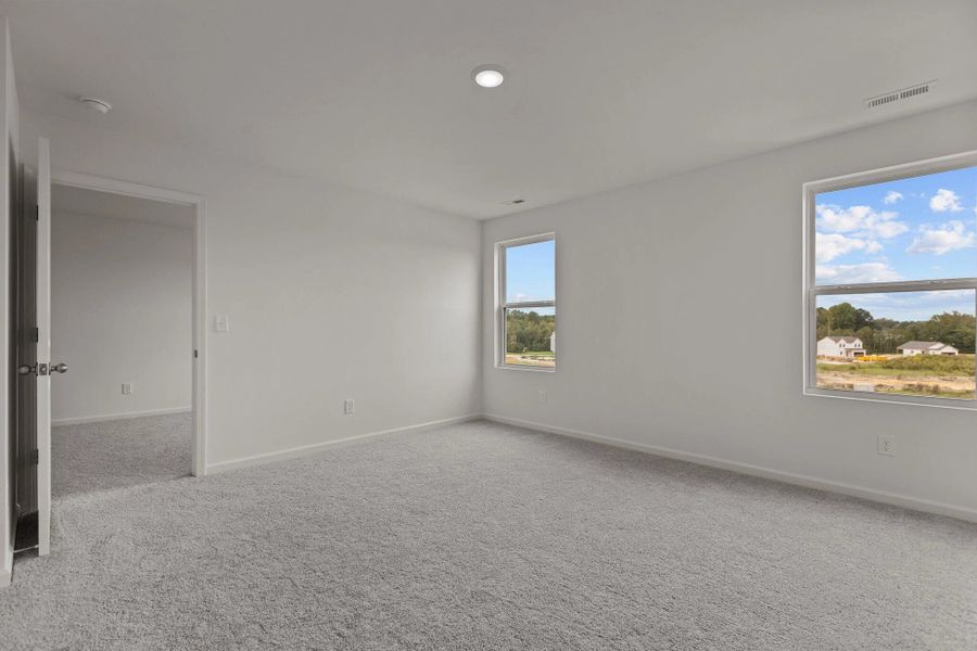 Representative unfurnished interior of a home built from the Radiance by Starlight Homes in Green Hill, Louisburg (Image 25).