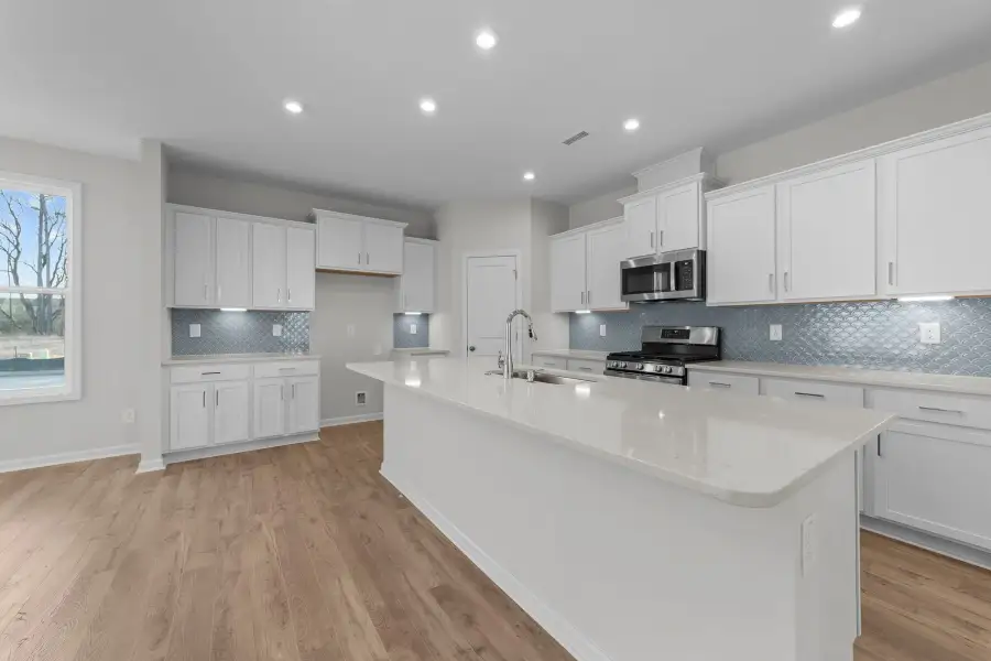 Representative furnished interior of a home built from the The Holly by Chesapeake Homes in Neill's Pointe, Angier (Image 7).