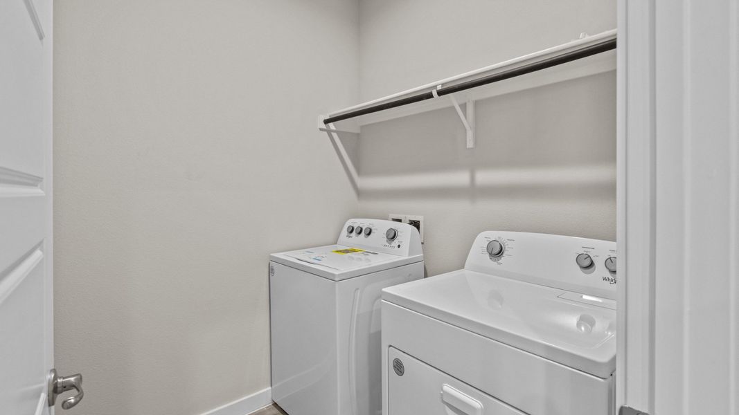 Representative furnished interior of a home built from the PORTALES by D.R. Horton in Northwest Passage, Midland (Image 8). Representative furnished interior of a home built from the PORTALES by D.R. Horton in Northwest Passage, Midland (Image 8).