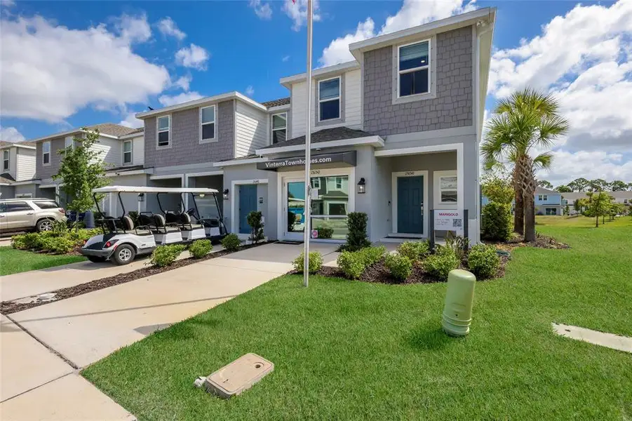 Front exterior of a new home in , Nokomis, FL, highlighting curb appeal (Image 21).