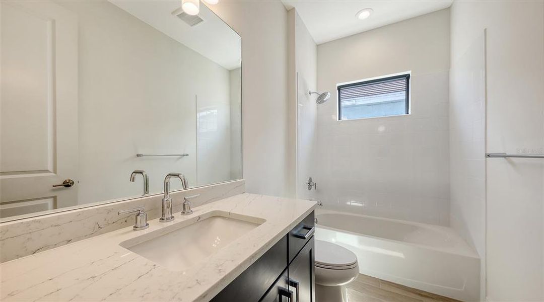 Furnished interior view inside a new home in Palm Grove, Lakewood Ranch (Image 4).