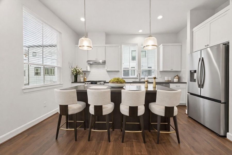 Furnished interior view inside a new home in The Corner At Buffalo Pointe, Houston (Image 9).