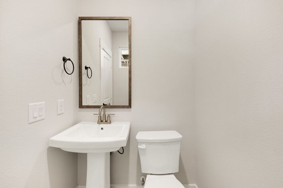 Furnished interior view inside a new home in Willow Grove Townhomes, Melissa (Image 15).