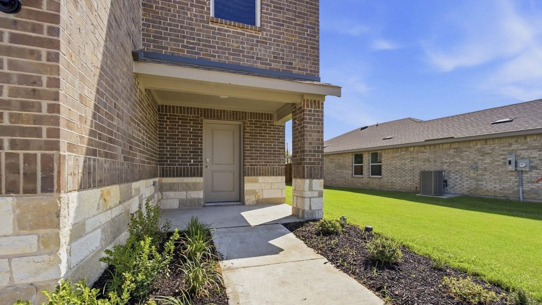 Exterior details and patio area of a home in Asher Oaks, Bonham (Image 3).