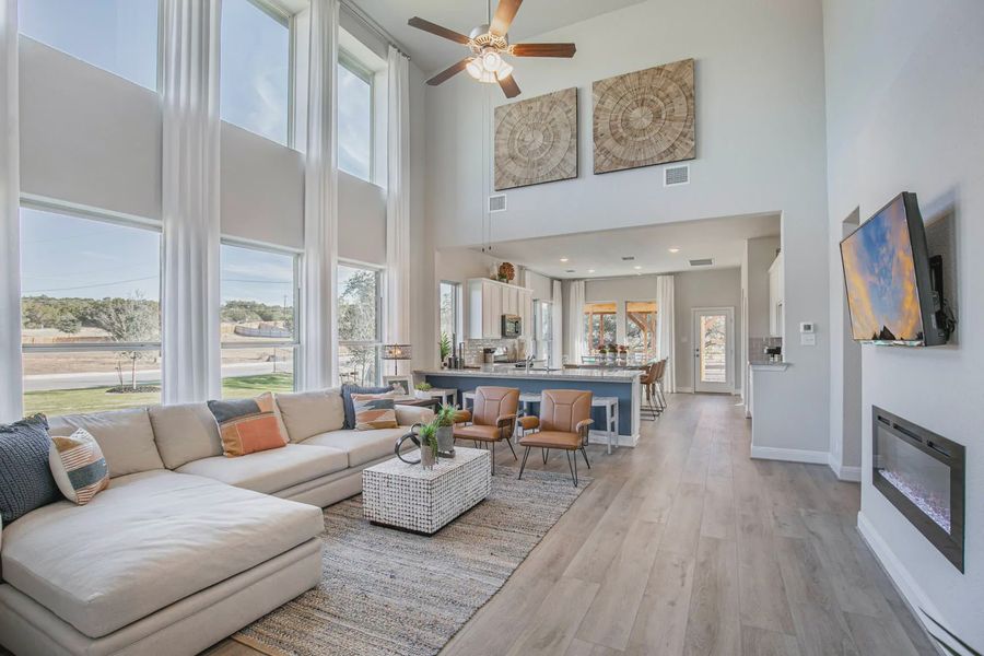 Representative furnished interior of a home built from the Lincoln by Chesmar Homes in Buffalo Crossing, Cibolo (Image 3).