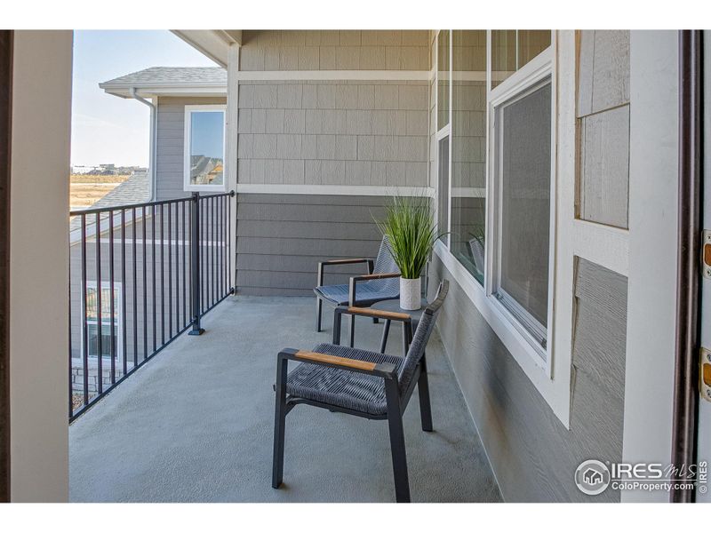 Exterior details and patio area of a home in The Lakes at Centerra - Discovery, Loveland (Image 4).