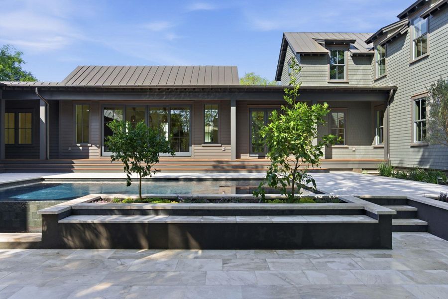 Exterior details and patio area of a home in , Sullivan's Island (Image 19).