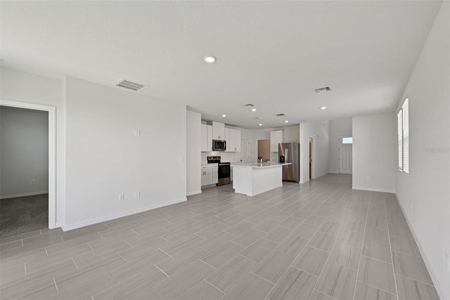 Spacious, unfurnished interior of a new home in Salt Meadows - Premier Series, Parrish (Image 12).