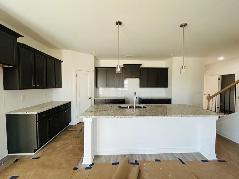 Furnished interior view inside a new home in Sutton's Landing, Statham (Image 9).