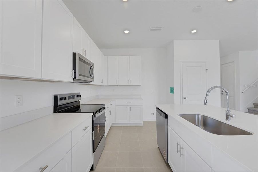 Furnished interior view inside a new home in Willowbrook North, Winter Haven (Image 8).
