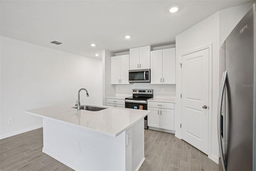 Furnished interior view inside a new home in Two Rivers - Classic Series, Zephyrhills (Image 9).