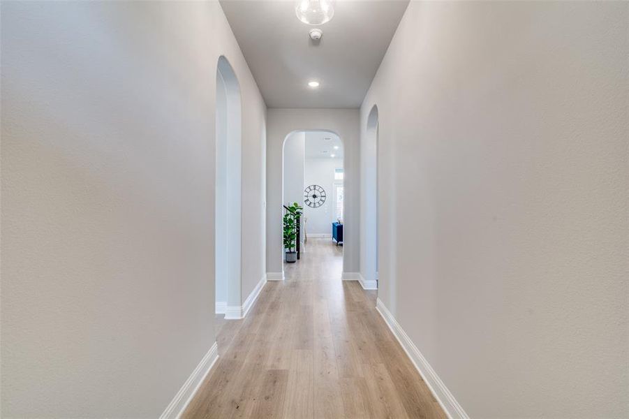 Hall featuring light hardwood / wood-style floors