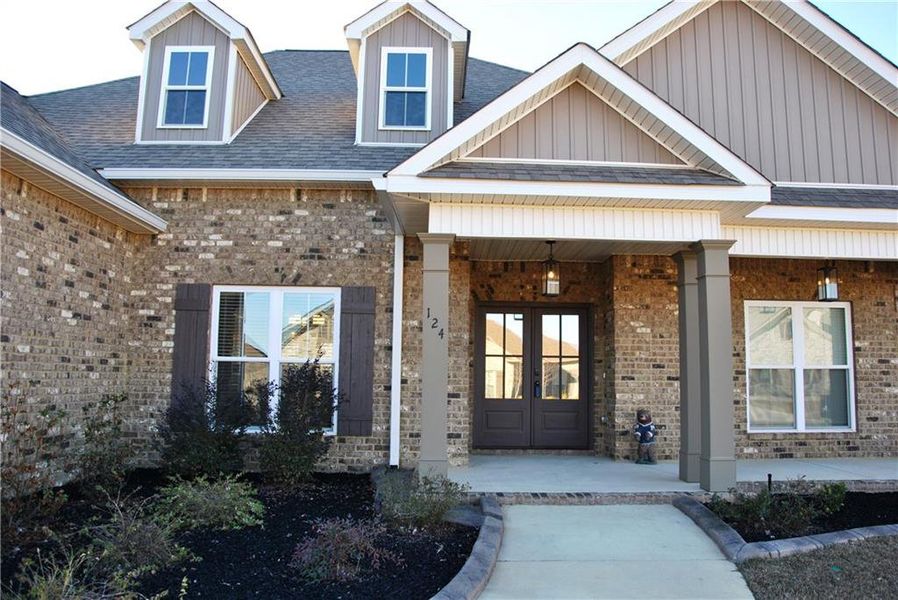 Front exterior of a new home in , Kathleen, GA, highlighting curb appeal (Image 25).