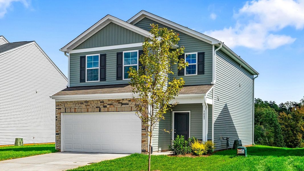 Front exterior of a new home in Bell West, Kernersville, NC, highlighting curb appeal (Image 2).
