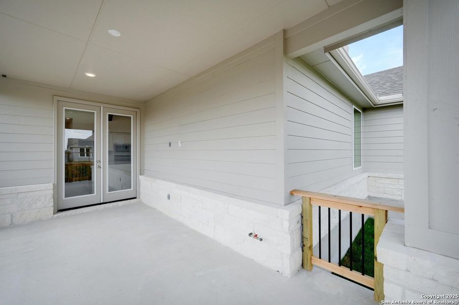Exterior details and patio area of a home in The Crossvine, Schertz (Image 18).