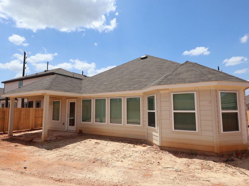 Exterior details and patio area of a home in Magnolia Ridge, Magnolia (Image 3).