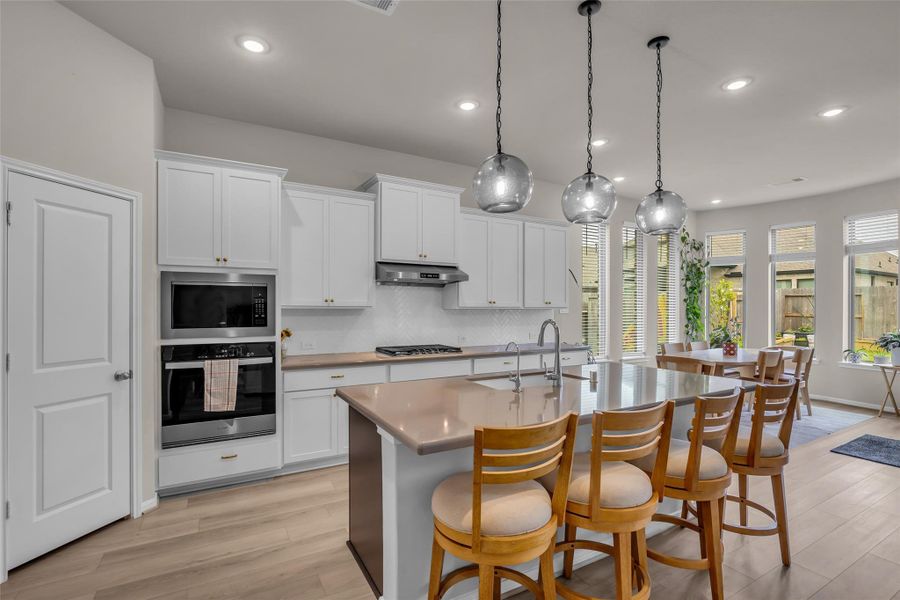 Furnished interior view inside a new home in , Conroe (Image 6).