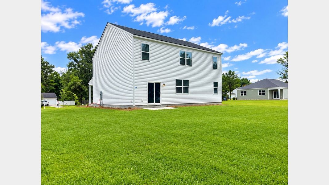 Exterior details and patio area of a home in Cypress Landing, Hardeeville (Image 4).