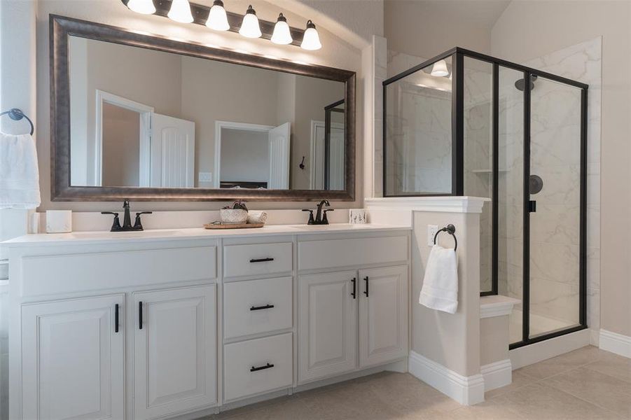 Primary bathroom with custom shower glass door