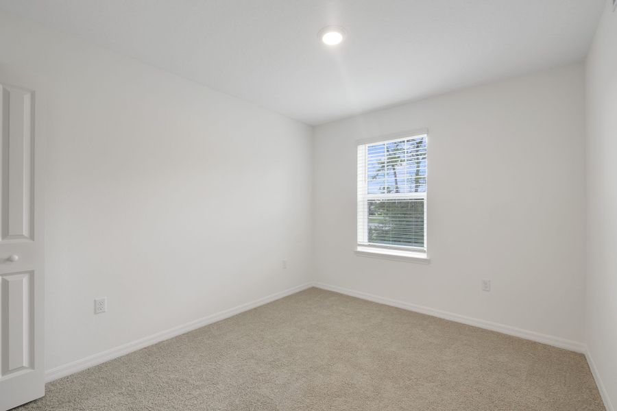 Spacious, unfurnished interior of a new home in Towns at Riverwalk, Sanford (Image 28). Spacious, unfurnished interior of a new home in Towns at Riverwalk, Sanford (Image 28).