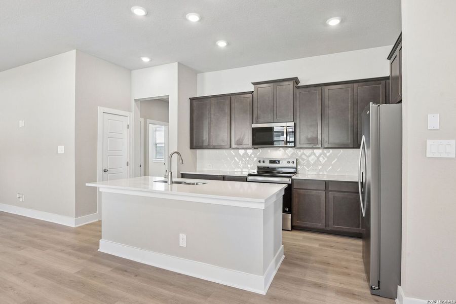 Furnished interior view inside a new home in Royal Crest, San Antonio (Image 10).