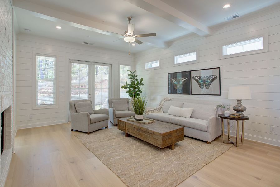 Elevated ceiling height throughout the expansive family room and generous covered porch