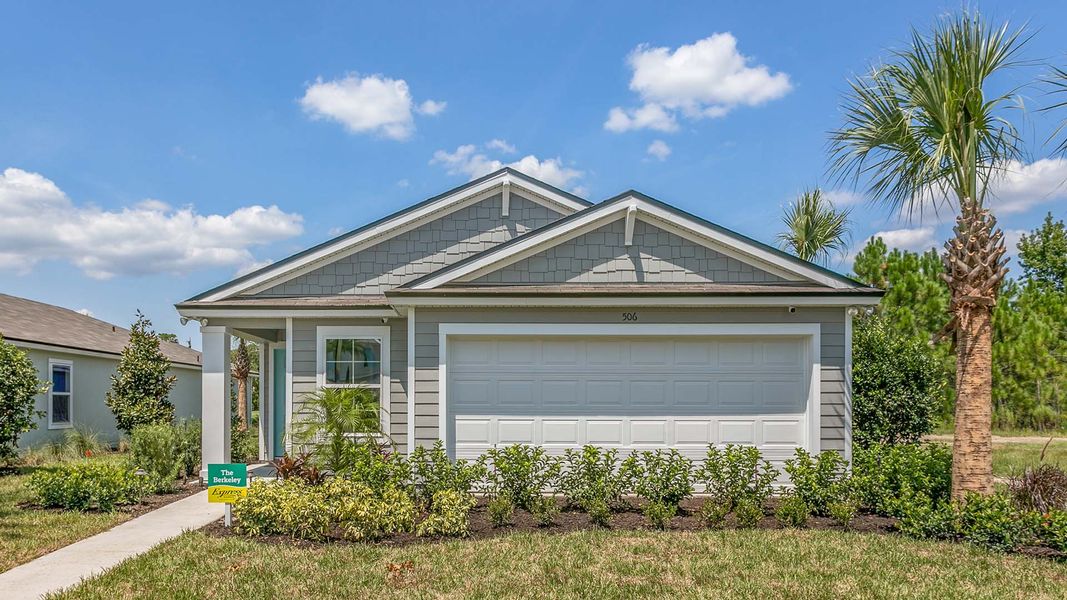 Front exterior of a new home in Grand Reserve, Bunnell, FL, highlighting curb appeal (Image 1). Front exterior of a new home in Grand Reserve, Bunnell, FL, highlighting curb appeal (Image 1).