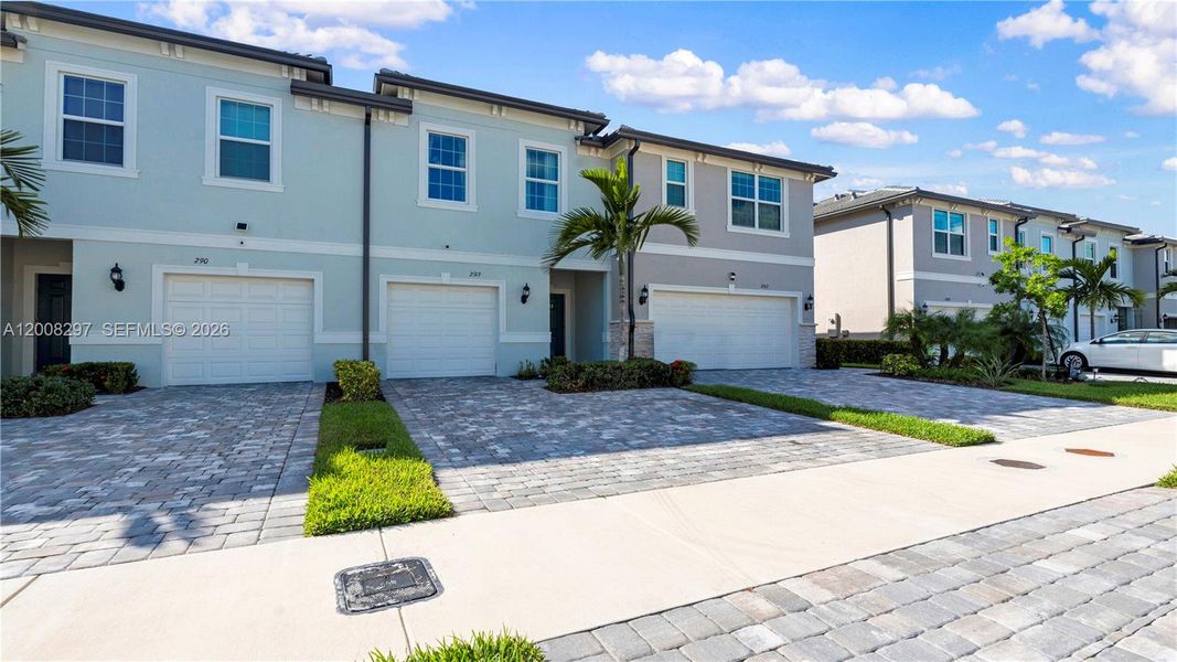 Front exterior of a new home in , Lauderdale Lakes, FL, highlighting curb appeal (Image 25).