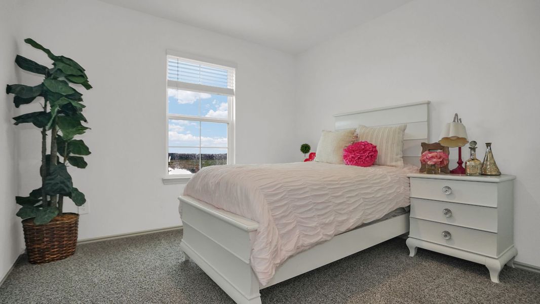Representative furnished interior of a home built from the HARRIS by D.R. Horton in Westward Pointe, Sealy (Image 5).