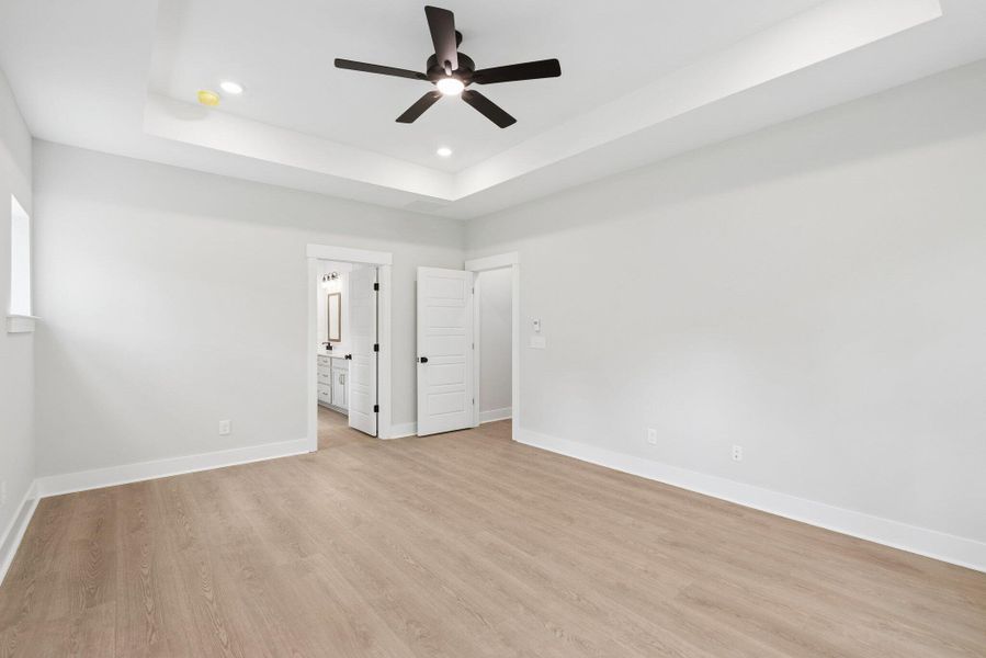 Spacious, unfurnished interior of a new home in Hidden Ponds Reserve, Awendaw (Image 11).