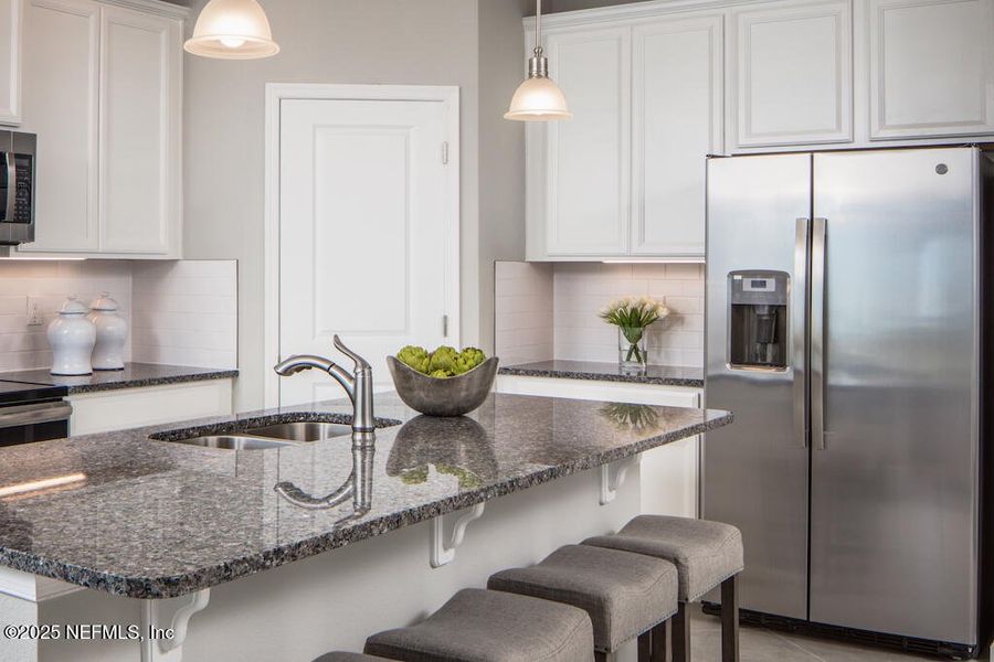Furnished interior view inside a new home in Seminole Palms Single-Family Homes, Palm Coast (Image 14).