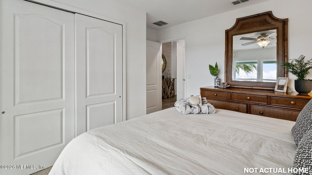 Furnished interior view inside a new home in Sawmill Branch, Palm Coast (Image 5).