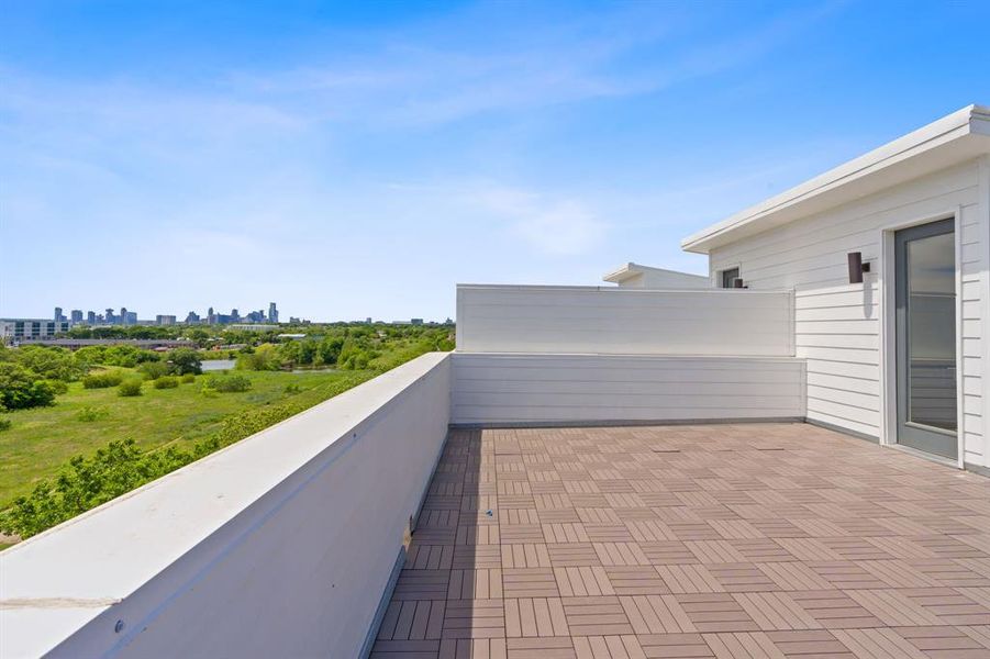 Rooftop overlooks park,airport tower, views of downtown