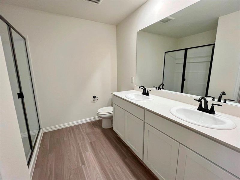Furnished interior view inside a new home in Labein Villas, Greenville (Image 12).
