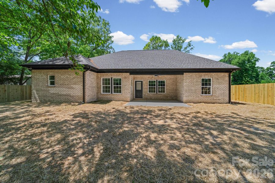 Exterior details and patio area of a home in , Matthews (Image 26).