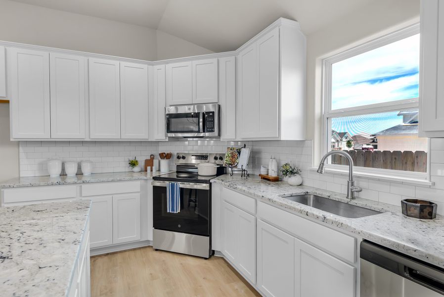 Representative furnished interior of a home built from the The Poppy by Avonley Homes in Rudder Pointe, Bryan (Image 31).