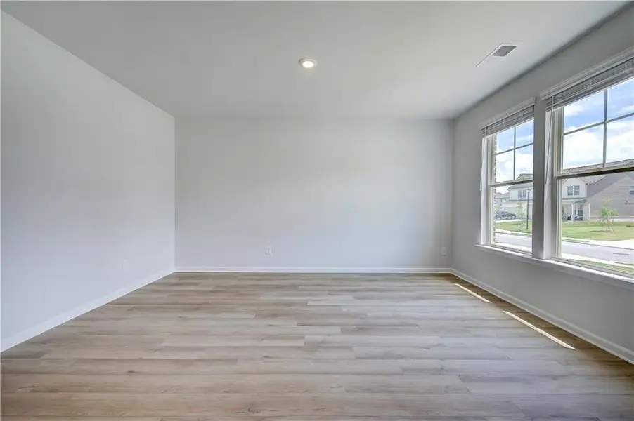 Spacious, unfurnished interior of a new home in Adagio, Dacula (Image 28).