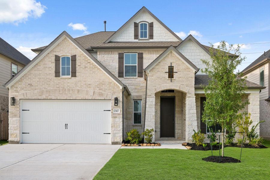 Front exterior of a new home in Morton Creek Ranch, Katy, TX, highlighting curb appeal (Image 14). Front exterior of a new home in Morton Creek Ranch, Katy, TX, highlighting curb appeal (Image 14).
