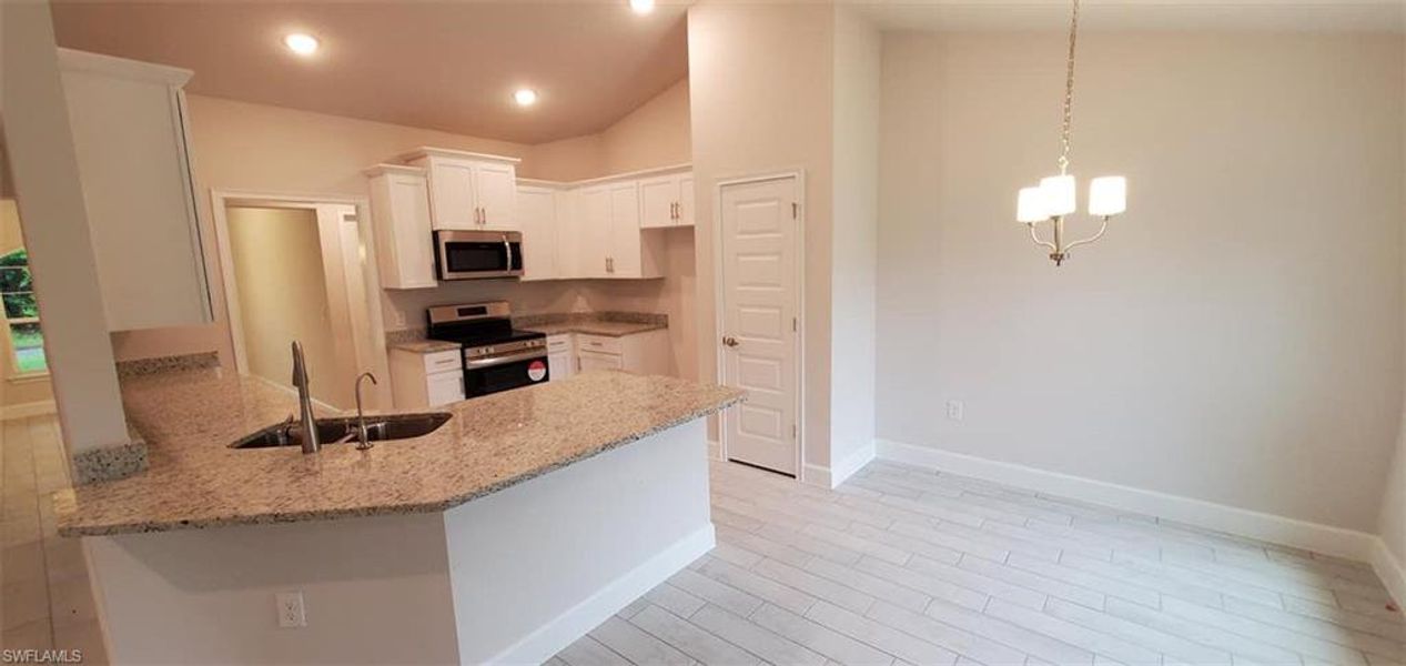 Furnished interior view inside a new home in Lehigh Acres, Lehigh Acres (Image 2).