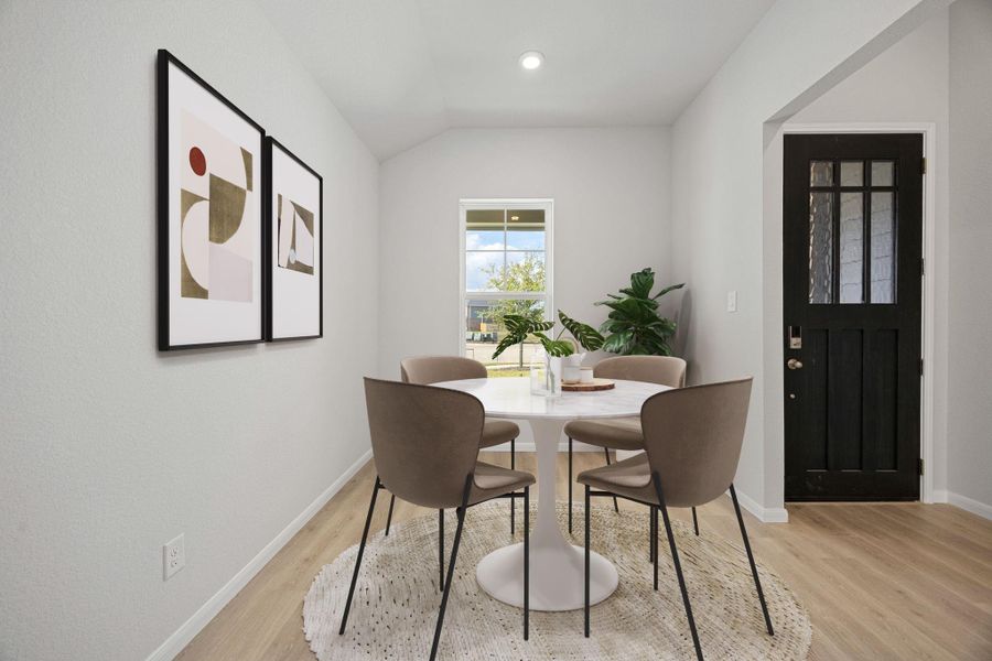 Create lasting memories with family and friends in this inviting dining room! It showcases high ceilings, recessed lighting, custom paint, and stunning wood-look flooring. Create lasting memories with family and friends in this inviting dining room! It showcases high ceilings, recessed lighting, custom paint, and stunning wood-look flooring.