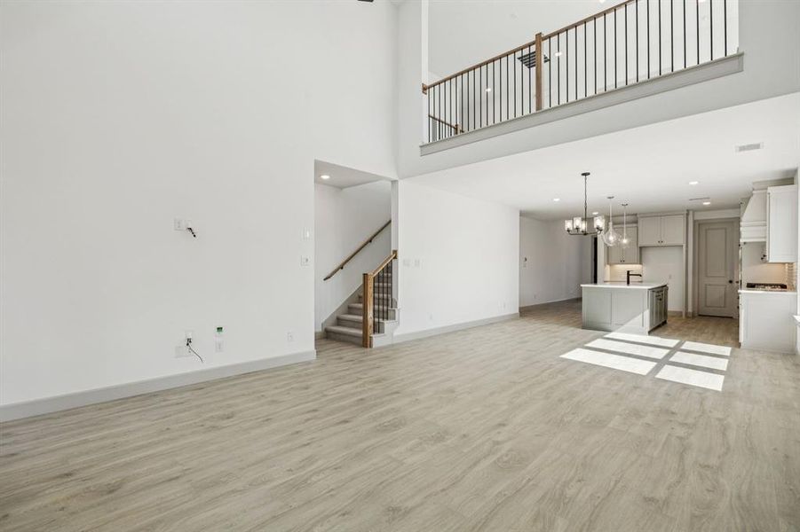 The game room features open railing overlooking the family room creating a multi-story entertaining space! The game room features open railing overlooking the family room creating a multi-story entertaining space!