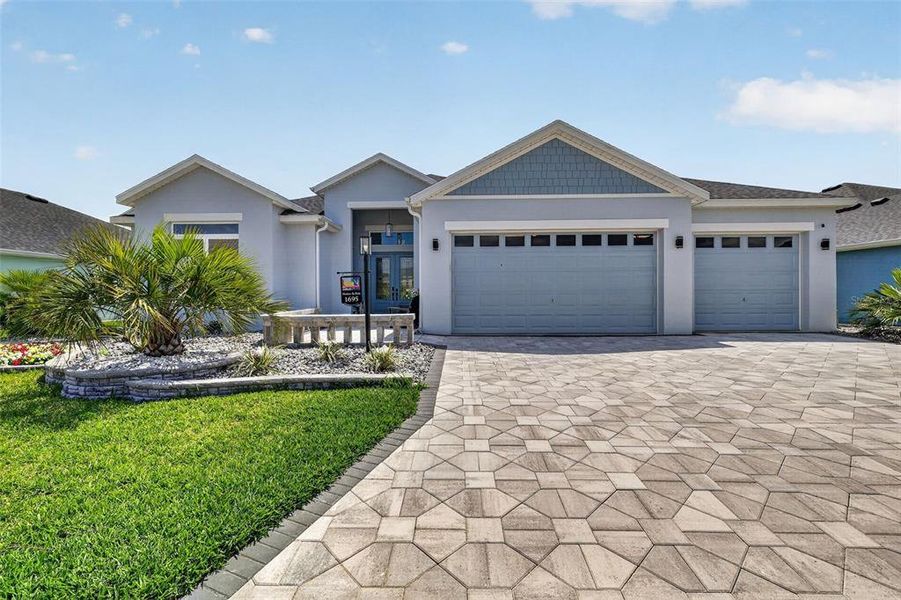 Front exterior of a new home in , The Villages, FL, highlighting curb appeal (Image 23).