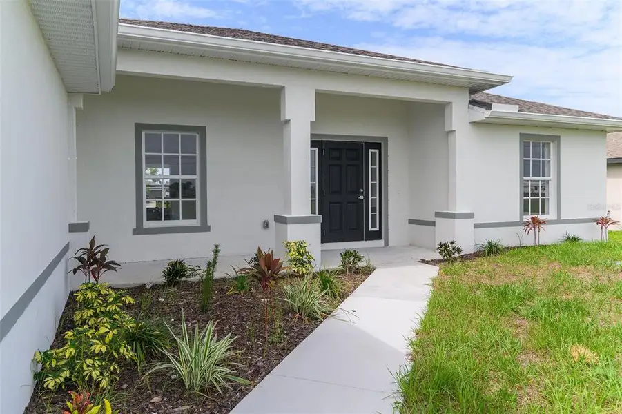 Exterior details and patio area of a home in , Cape Coral (Image 3).