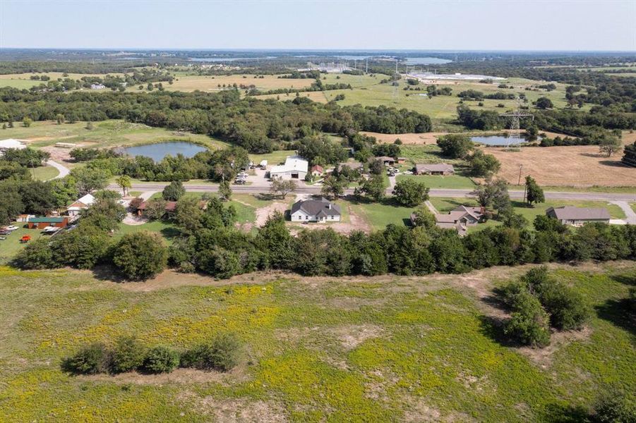 View of rural area with a nearby body of water and a tree filled landscape View of rural area with a nearby body of water and a tree filled landscape