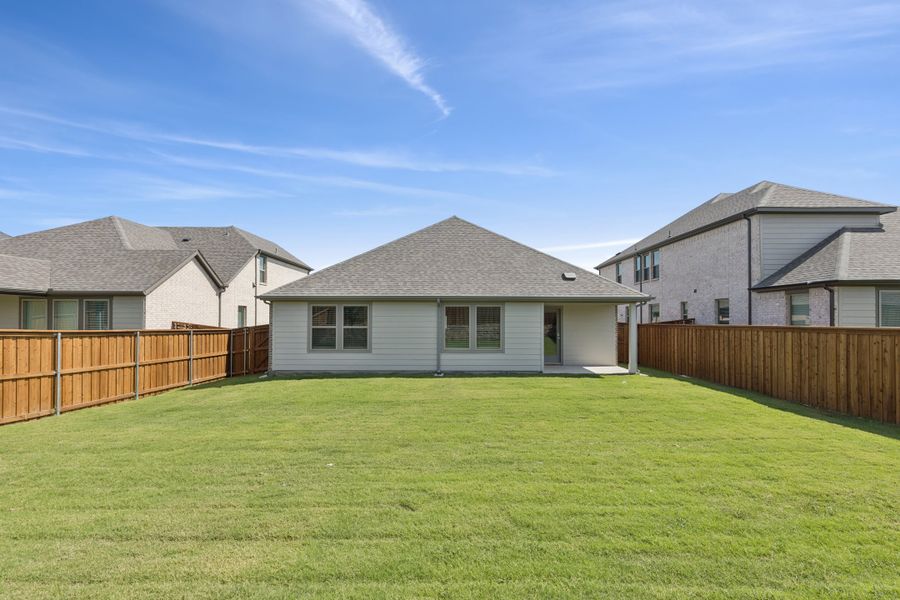 Covered Patio in the Heisman home plan by Trophy Signature Homes – REPRESENTATIVE PHOTO