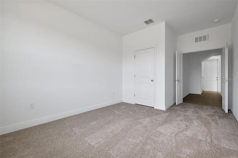 Spacious, unfurnished interior of a new home in Serenade at Ovation, Winter Garden (Image 30). Spacious, unfurnished interior of a new home in Serenade at Ovation, Winter Garden (Image 30).