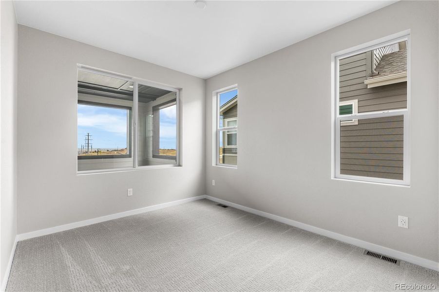 Spacious, unfurnished interior of a new home in Tribute at Lyric, Lone Tree (Image 21).